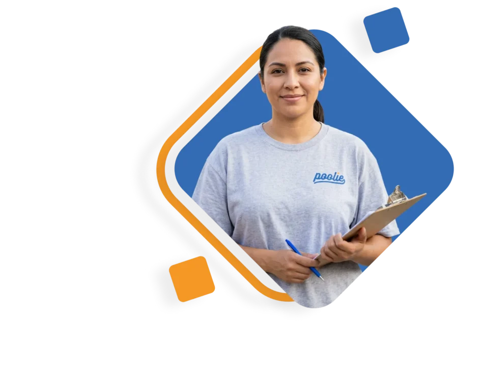 Poolie technician holding a clipboard beside a backyard pool
