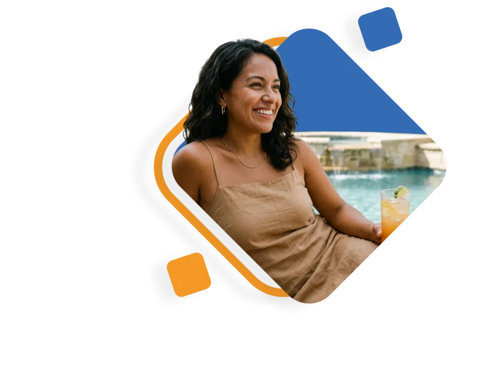 Smiling homeowner relaxing with a drink beside her repaired Texas pool